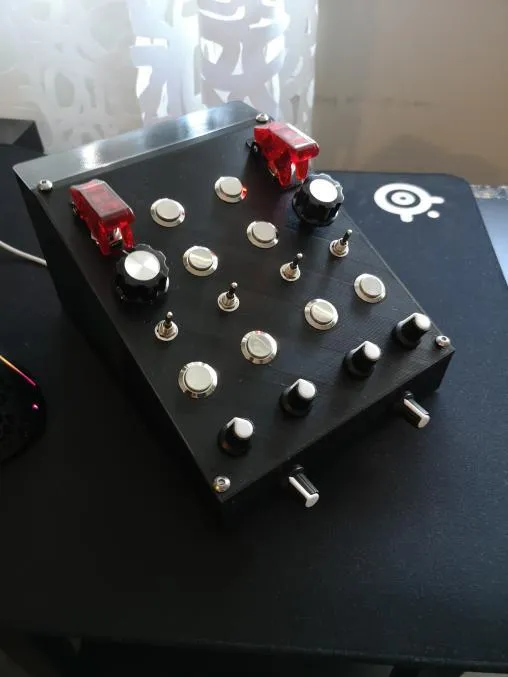 The simulator button box with switches and rotary knobs