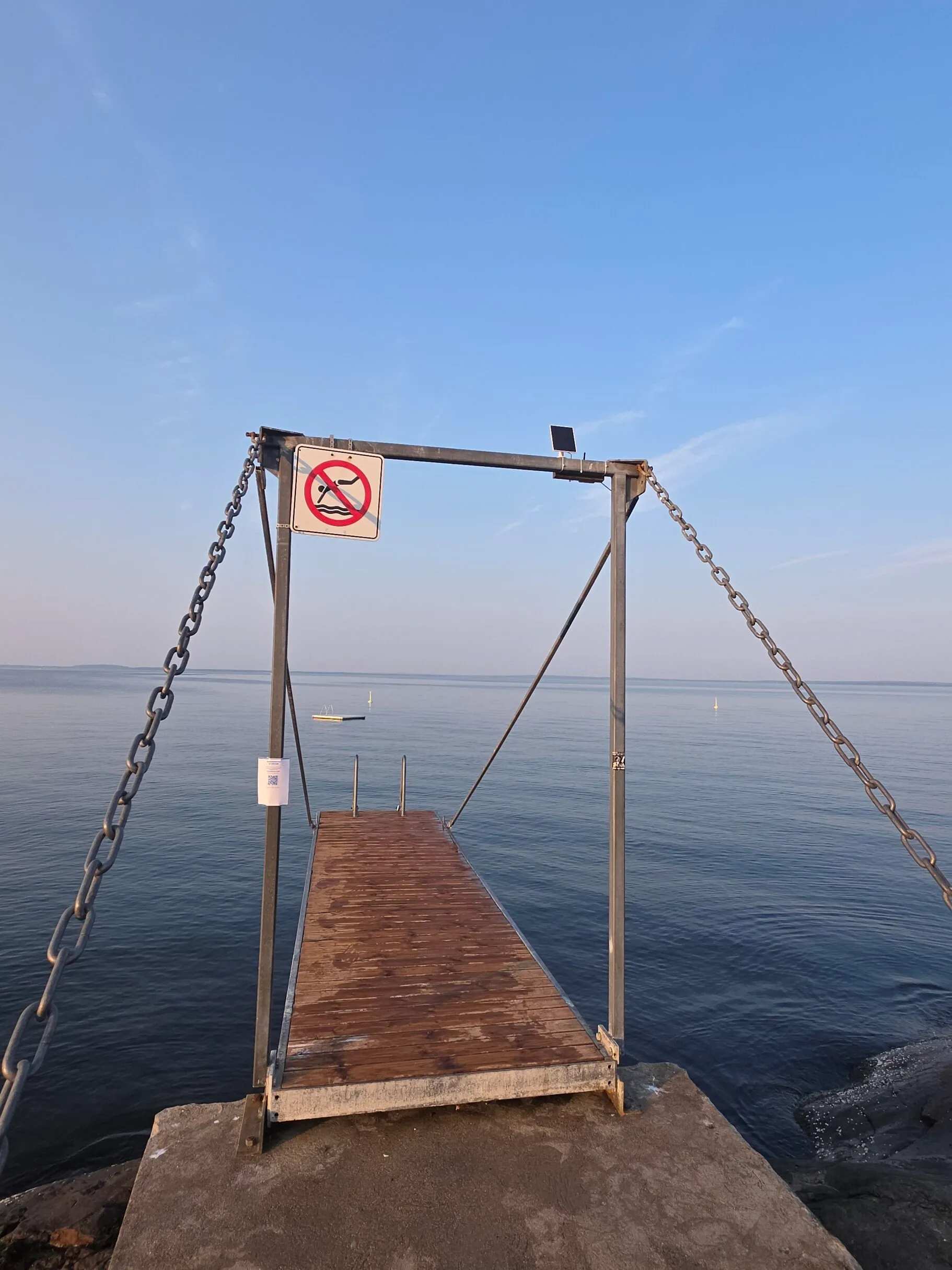 The pier with the solar-powered sensor
